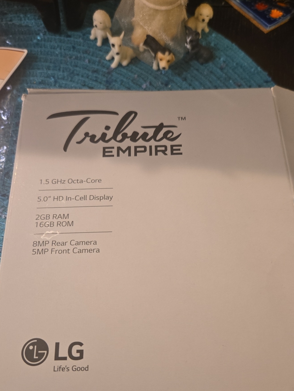 LG Tribute Empire White Retail Box With LG CELL PHONE
